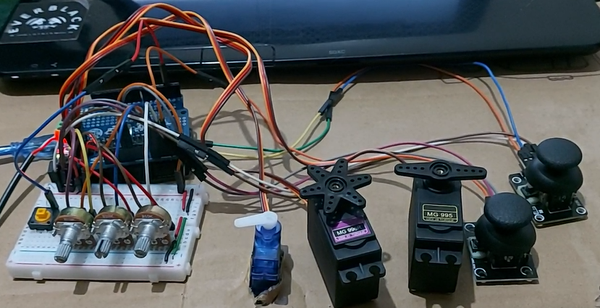 Realtime Servo Motor Control with Switches and Potentiometers