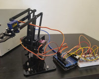 Controlling 4DOF Robotic Arm Claw Kit with 16 channel PWM/Servo Shield using analog input.